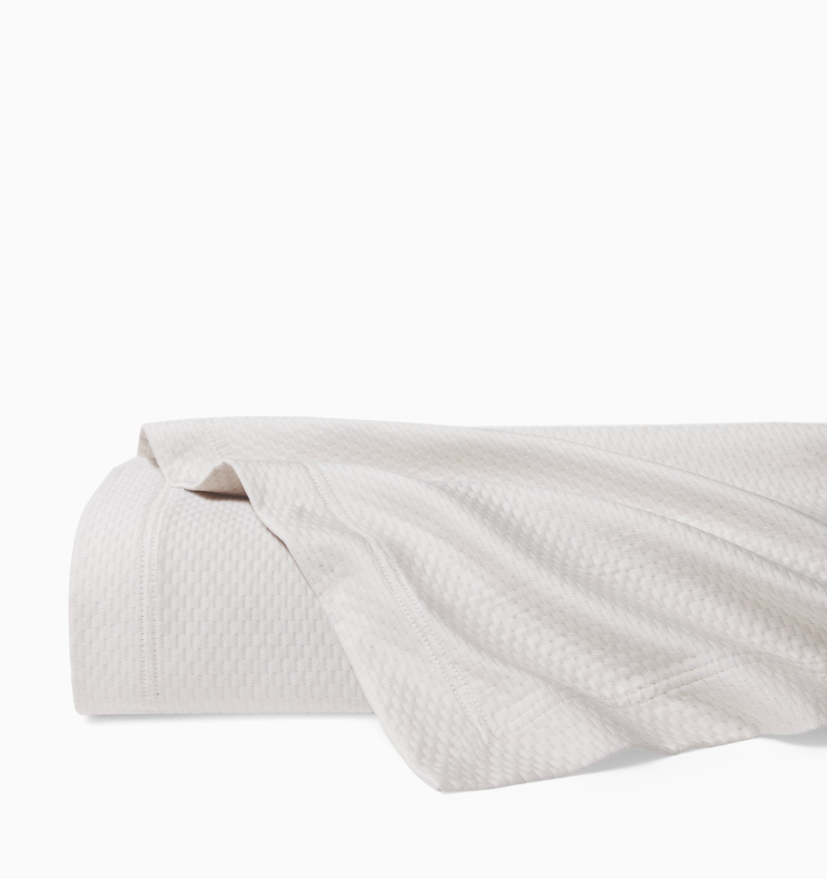 Perrio coverlet in bone folded