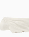 Spinato blanket in ivory folded