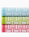 Stack of the Tirreno beach towels top to bottom clearwater, kiwi, coral