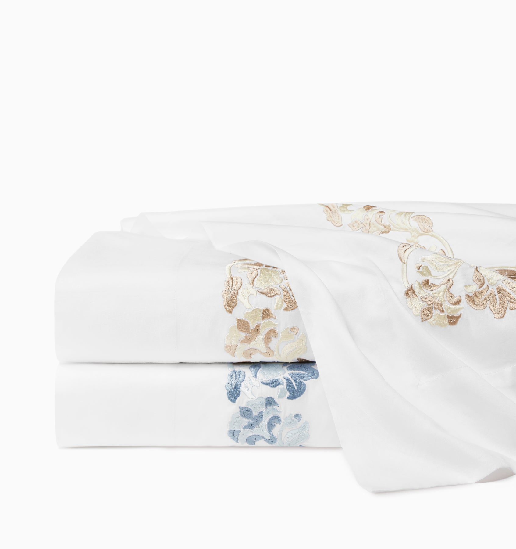Tralcio flat sheets in white/sand & white/sea folded and stacked