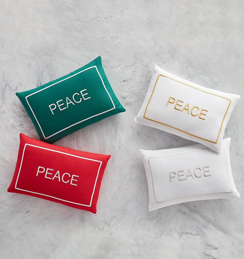 SFERRA Peace Decorative Pillows feature uplifting words or phrases in colored satin stitch embroidery on pure linen