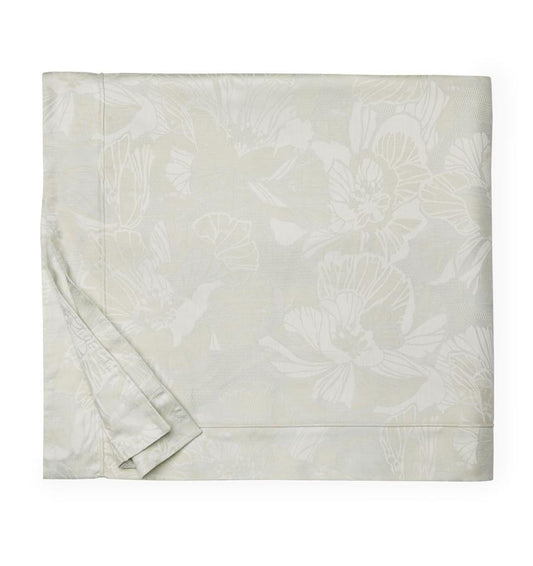 A folded SFERRA Fiore Duvet Cover with a floral jacquard pattern against a white background.