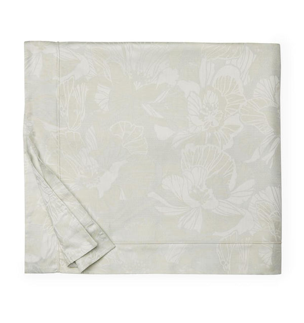 A folded SFERRA Fiore Duvet Cover with a floral jacquard pattern against a white background.