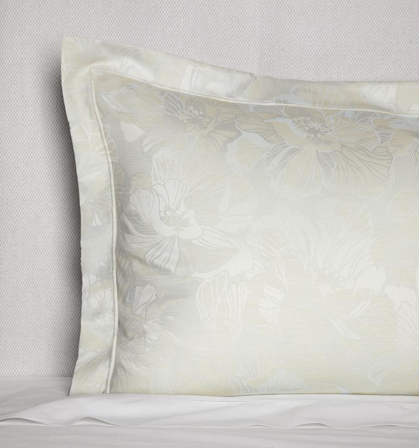 A SFERRA Fiore Sham with a floral jacquard pattern against a grey background.