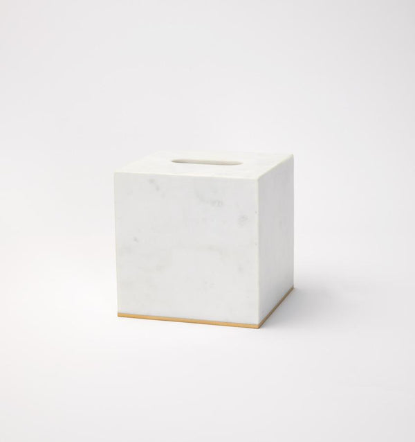 Gold-trimmed white marble tissue holder against a white background.