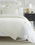 SFERRA Bari Coverlet in ivory diamond pique with lustrous sheen and a softly finished hand.