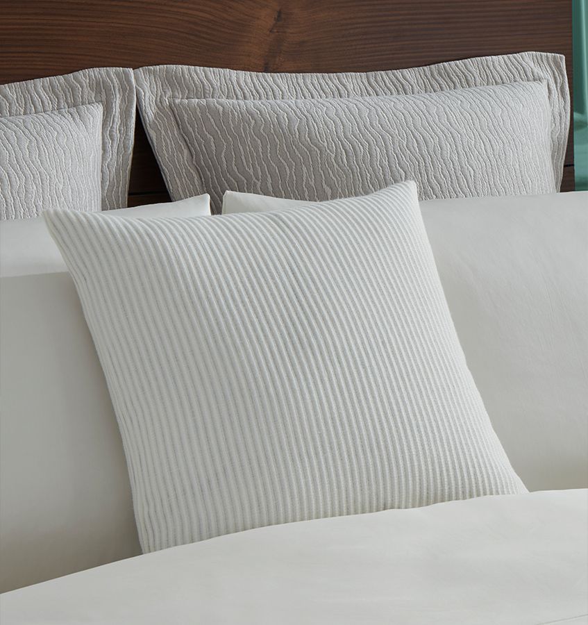 Lucca Decorative Pillow features a woven stripe pattern in an elegant arrangement of alternating yarn weaves, adding dimension and tonal interest.