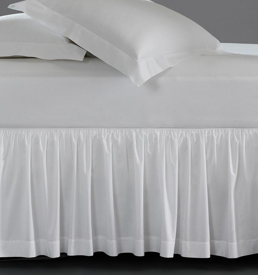 A luxury SFERRA bed skirt in crisp Italian cotton percale. The Celeste Collection is available in an array of colors. 