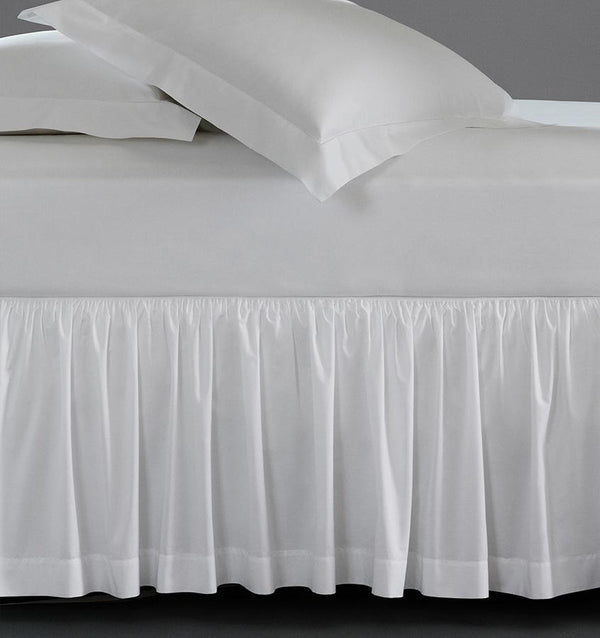 A luxury SFERRA bed skirt in crisp Italian cotton percale. The Celeste Collection is available in an array of colors. 
