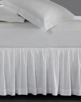 A luxury SFERRA bed skirt in crisp Italian cotton percale. The Celeste Collection is available in an array of colors. 