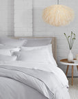 Celeste Duvet Cover, SFERRA's best-selling percale bedding, is woven in Italy from pure, extra-long-staple cotton for a super soft hand.