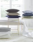 A luxury SFERRA cotton bed skirt in a woven honeycomb pattern. The Favo Collection is available in an array of colors. 