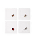 SFERRA Insetti cocktail napkins feature endearing insects on white hemstitched linen napkins.