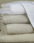 The SFERRA Kingston Blanket, a classic waffle weave of our thermal blanket in pure cotton. 