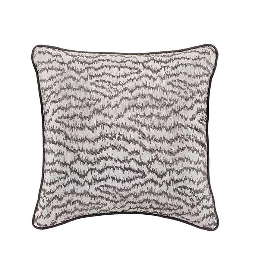 Add a pop of bold graphic texture to your decor with Morra, bearing a lovely ikat-type allover pattern. Its silver-hued accent colors make an easy addition to any room.