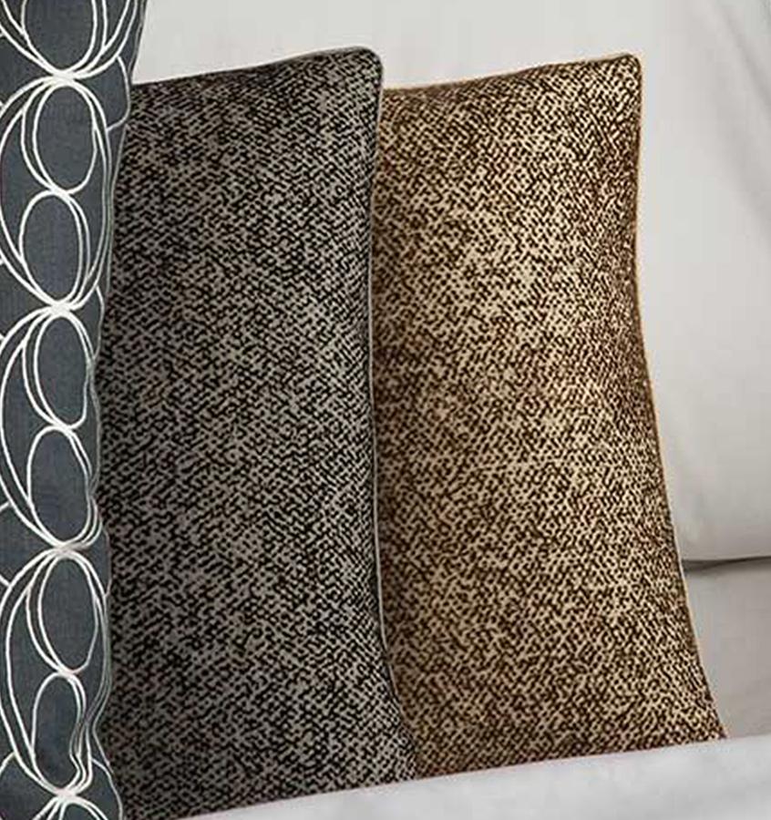 SFERRA Nissa Decorative Pillow features soft colors of velvety flocking pressed atop a lush woolen ground, similar to a suiting fabric.