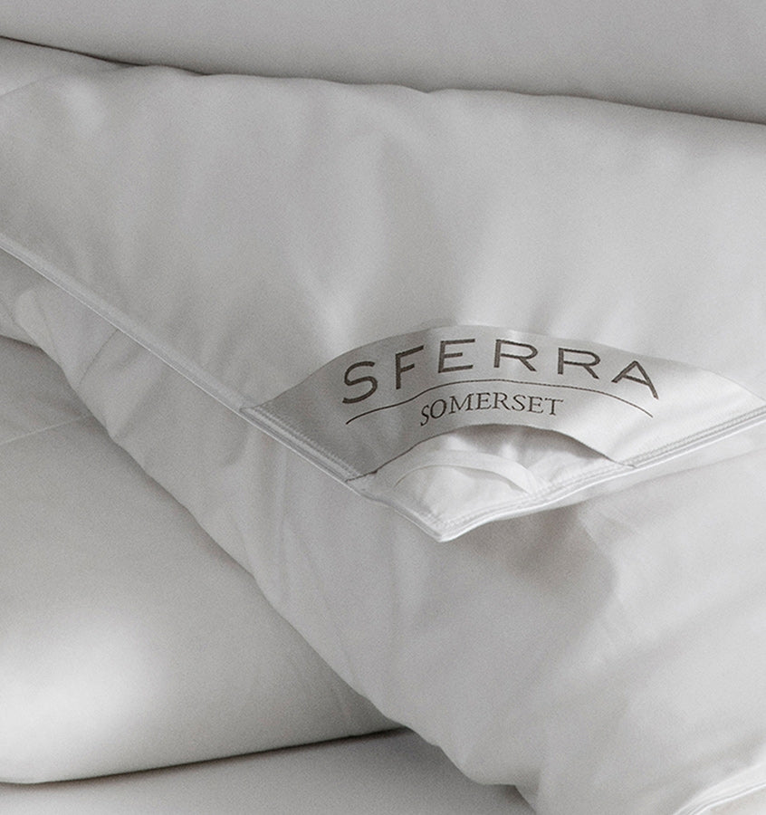 Filled with Polish white goose down and encased in a pure cotton sateen, the Somerset duvet and pillows keep their dreamy loft night after night.