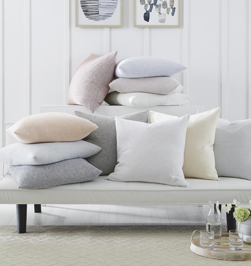 Terzo pillows and throws feature a classic basket weave pattern in soft, versatile colors.